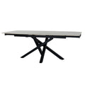 Romanby Stone extending dining table by Hill Interiors, showing the elegant stone surface and extendable design in a modern dining room setting.