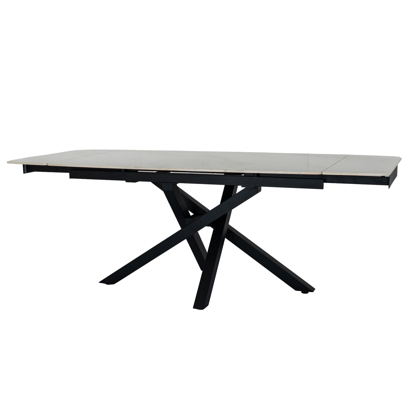 Romanby Stone extending dining table by Hill Interiors, showing the elegant stone surface and extendable design in a modern dining room setting.