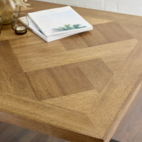 Julian Bowen Aron dining table with a sleek wooden surface and modern design, suitable for contemporary dining rooms.