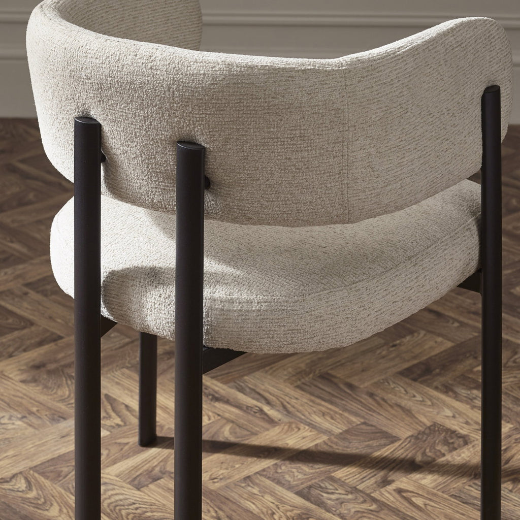 Julian Bowen Bolivia dining set with wooden table and matching chairs, shown with a modern design and natural wood finish.