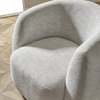 Julian Bowen Bowline swivel accent chair with a modern design, showcasing a cushioned seat and sleek wooden legs.