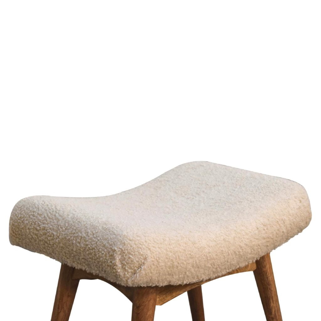 Artisan Boucle Cream Curved Bench stool with plush upholstery and wooden legs, modern design for living or dining spaces.