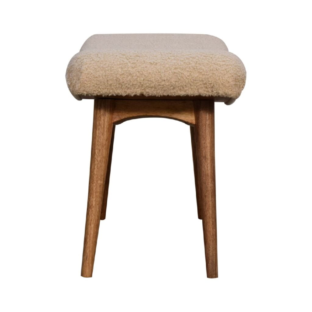 Artisan Boucle Cream Curved Bench stool with plush fabric upholstery and wooden legs, designed for stylish seating.
