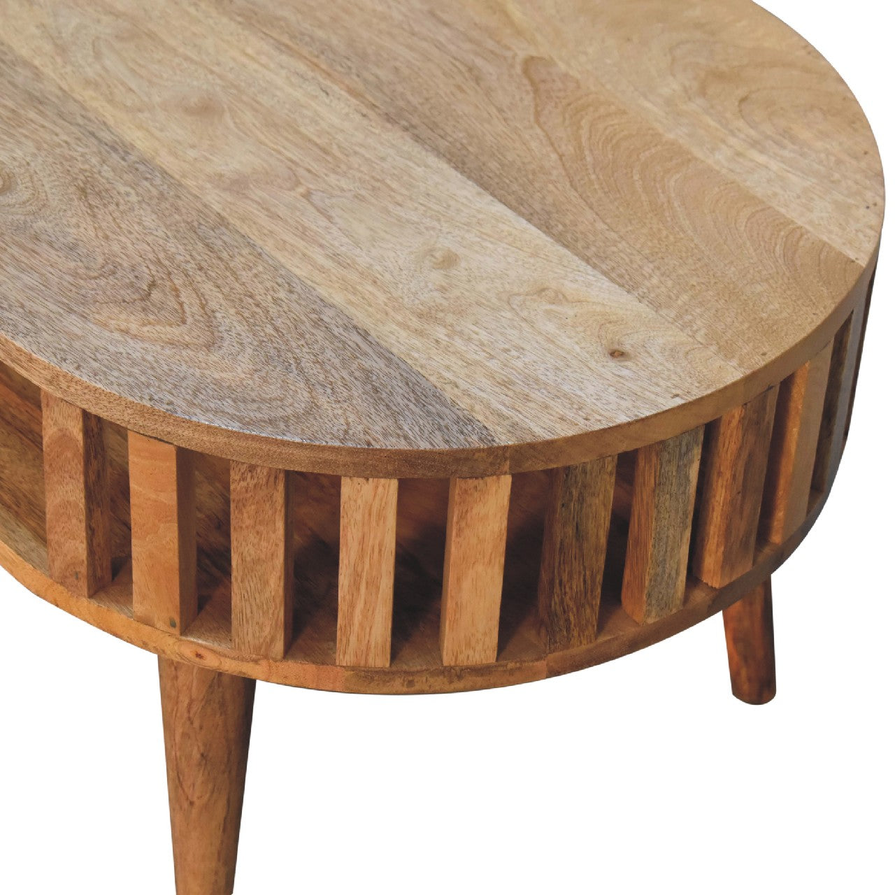 Artisan Ariella coffee table with a sleek wooden surface and modern design, shown in a contemporary living room setting.