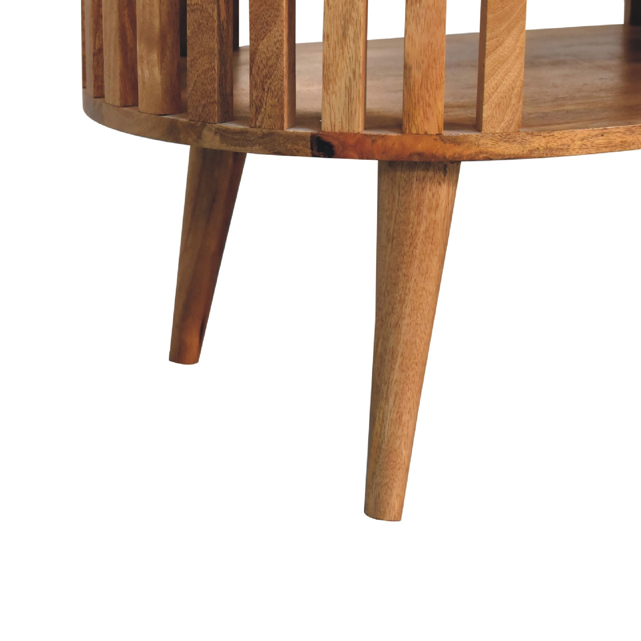 Artisan Ariella coffee table with a sleek wooden surface and modern design, shown from a side angle.