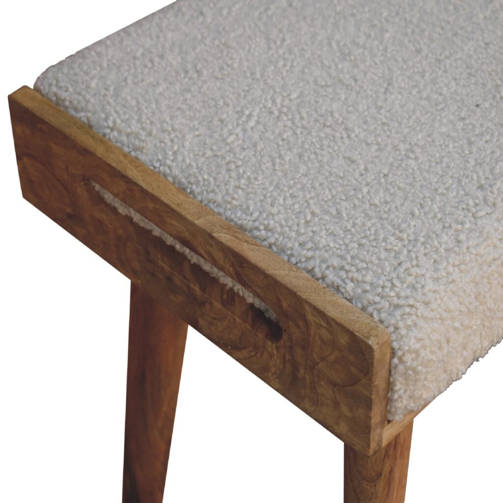 Artisan boucle cream tray-style footstool with a soft, textured upholstery and sturdy wooden legs, ideal for living room decor.