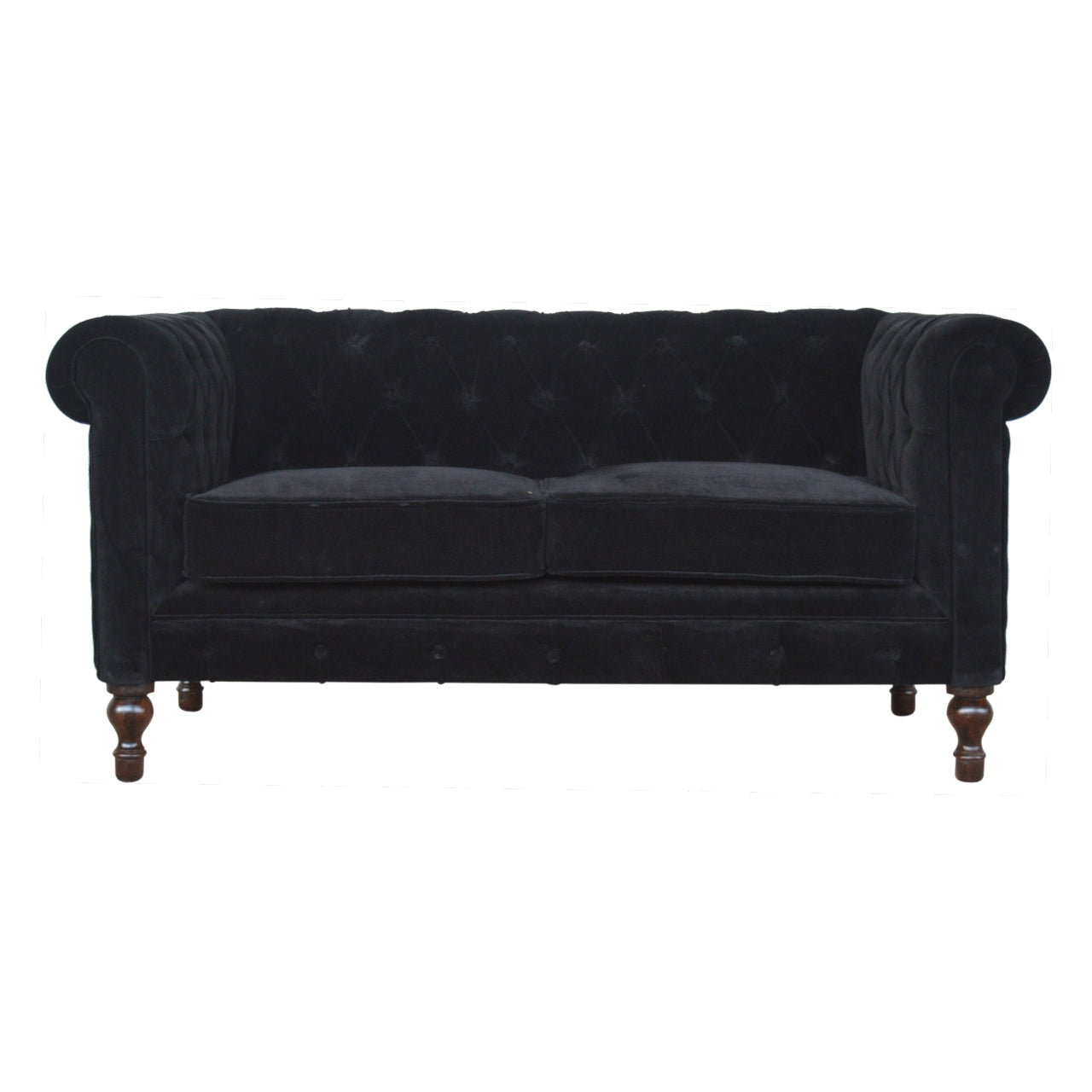 Artisan velvet Chesterfield sofa with deep button tufting and rolled arms, showcasing luxurious fabric and classic design.