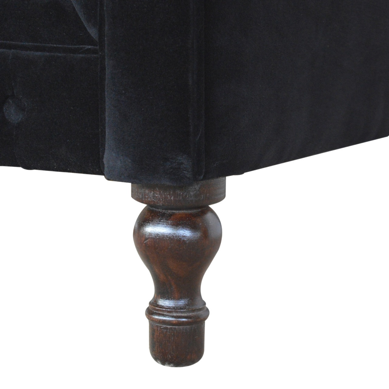 Artisan velvet Chesterfield sofa with deep button tufting and rolled arms, showcasing luxurious upholstery and classic design.