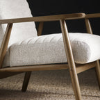Julian Bowen Ivy Armchair accent chair with plush upholstery and wooden legs, stylish and comfortable for living room decor.