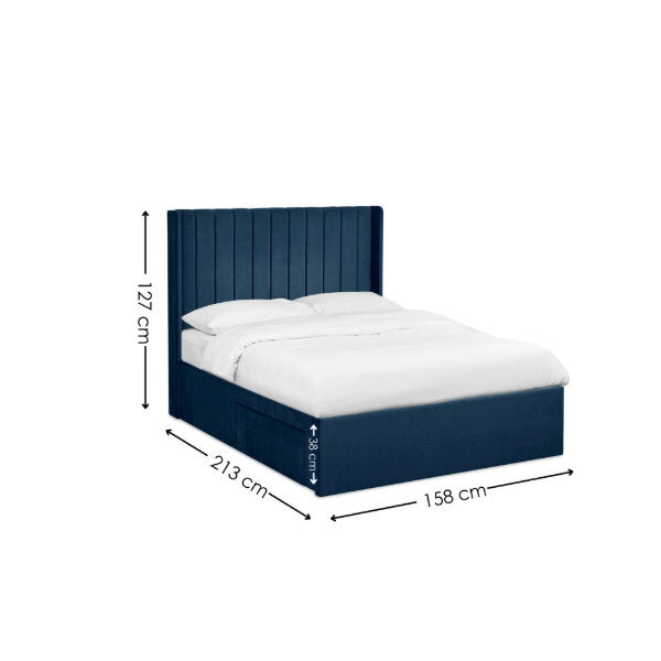 Julian Bowen Leila Bed with a modern wooden frame and neutral upholstery shown in a cozy bedroom setting.