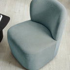 Julian Bowen Lunetta accent chair with plush fabric upholstery and modern design, perfect for living room or bedroom decor.