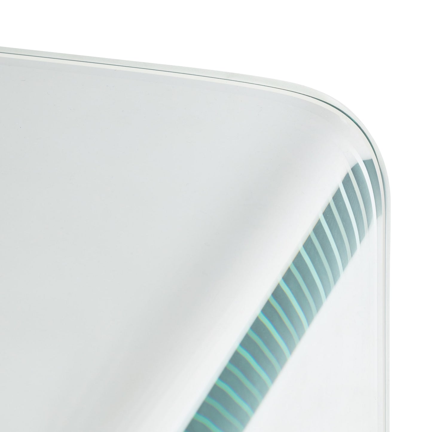 Close-up view of the smooth rounded bent glass corner on the Amalfi writing desk