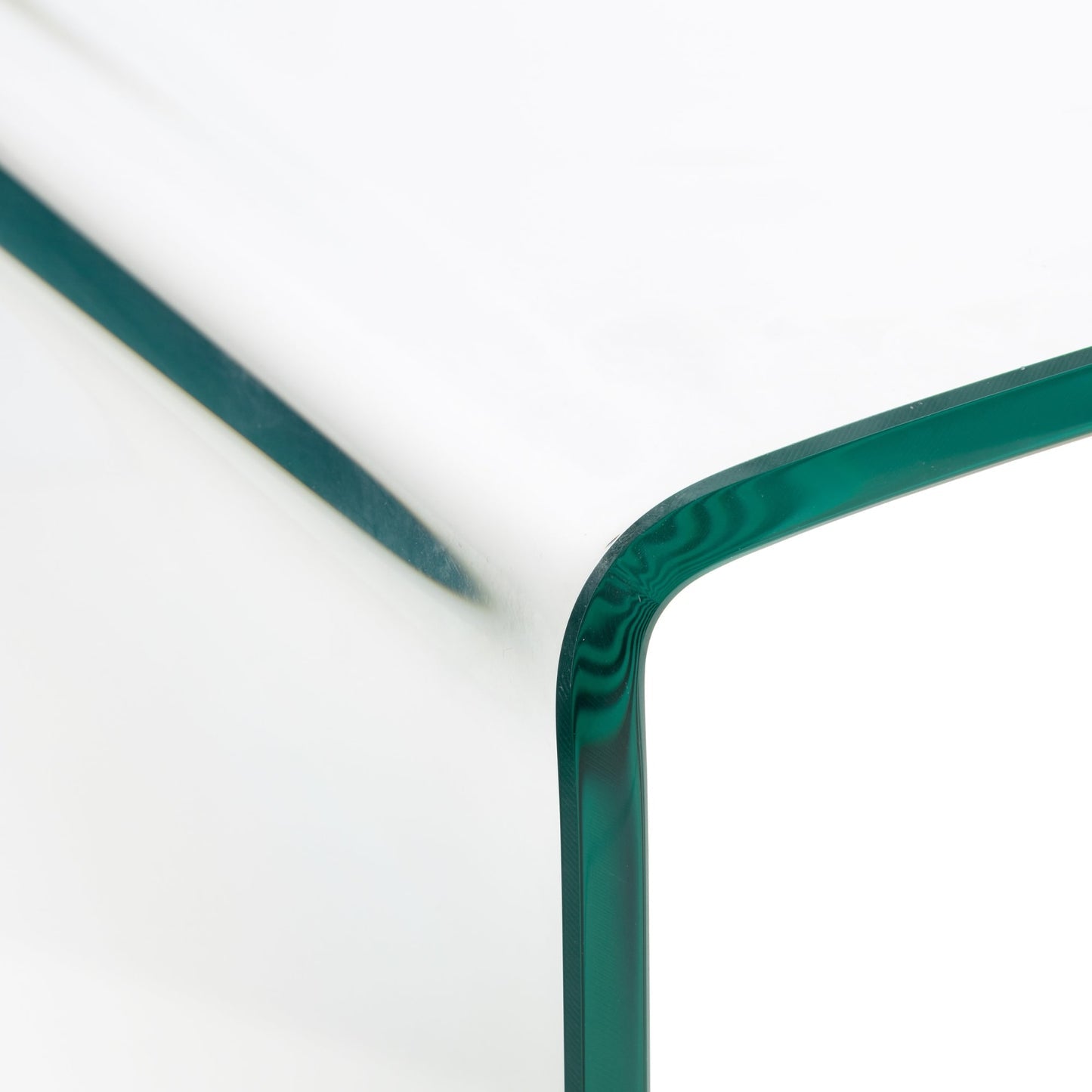 Detail shot showing the thick polished safety glass edge of the Amalfi desk