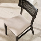 Rear angle view showing the sturdy wooden frame and woven back detail of the Annika dining chair