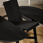 Close-up shot of the internal butterfly extension leaf opening on the Annika black table
