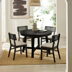 Annika black extending dining table styled with matching Annika rattan back dining chairs