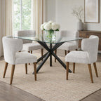 Avia Mist grey textured dining chairs styled around a glass dining table in a bright modern dining room