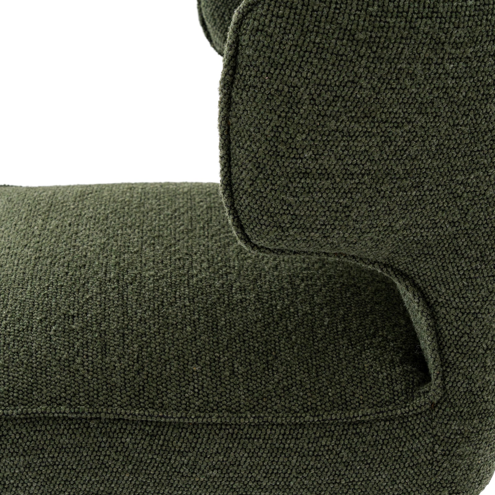 Close-up view of the wrap-around backrest arm and dark frame on the Avia Moss green dining chair