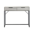 Front view of the Bali grey oak 2 drawer dressing table desk with black lip handles and sturdy metal legs