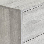 Close-up view of the grey oak wood effect finish and corner joint construction on the Bali chest