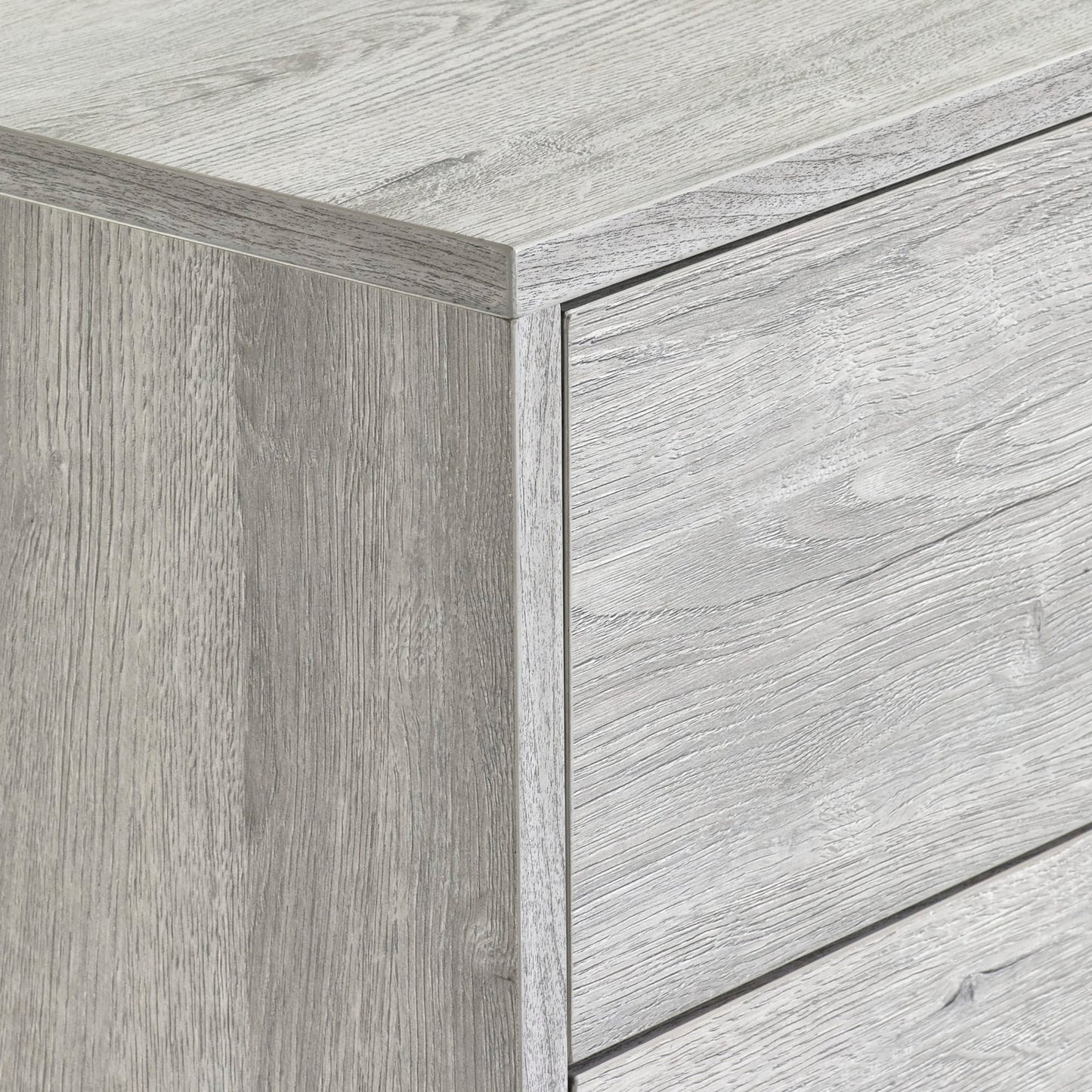 Close-up view of the grey oak wood effect finish and corner joint construction on the Bali chest