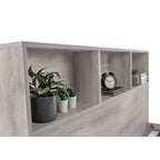 Close-up view of headboard storage shelving compartments in grey oak finish