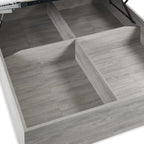 Internal view of the divided underbed ottoman storage base in grey oak finish