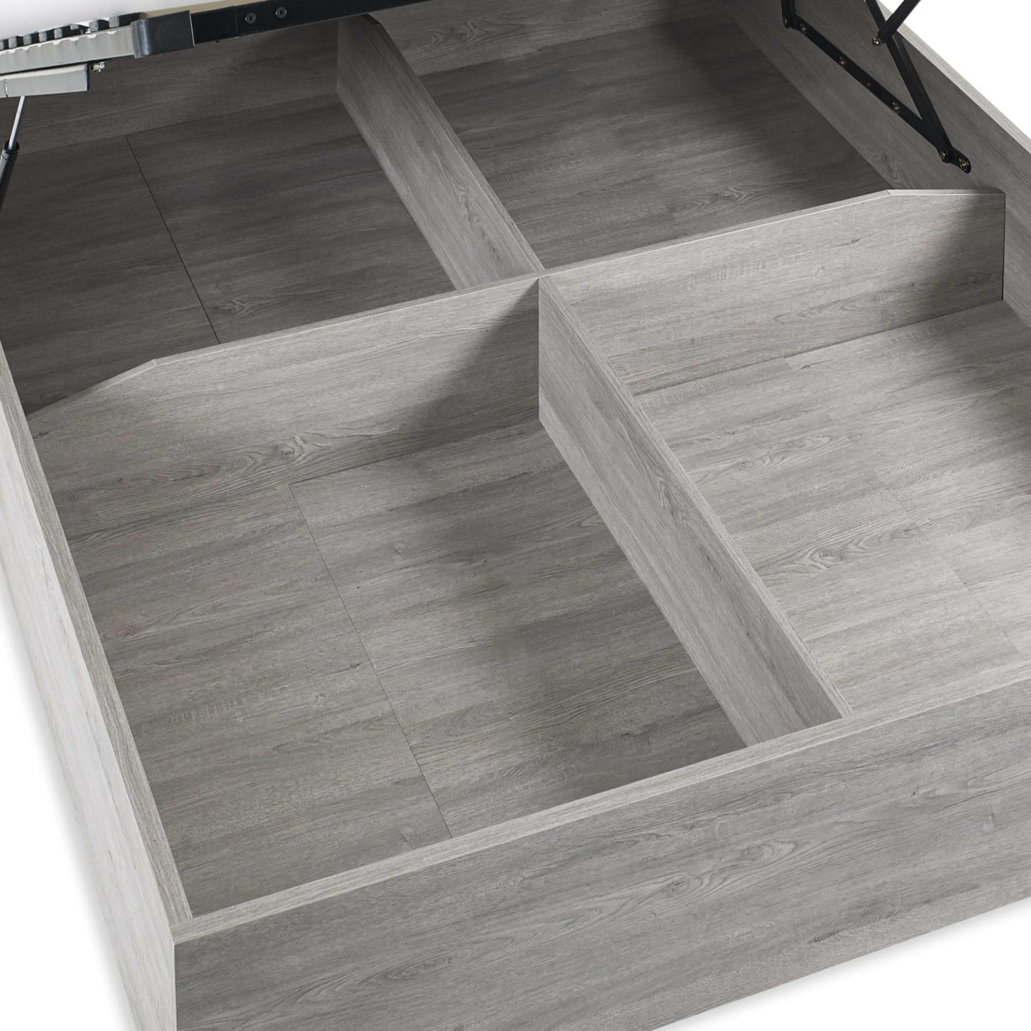 Internal view of the divided underbed ottoman storage base in grey oak finish