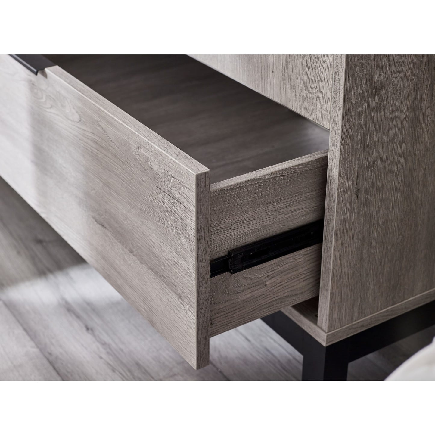 Close-up shot of the sturdy metal door hinge installed on the interior of the Bali grey oak wardrobe