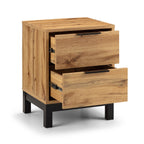 Front perspective view showing both extended pull-out drawers of the Bali natural oak bedside table