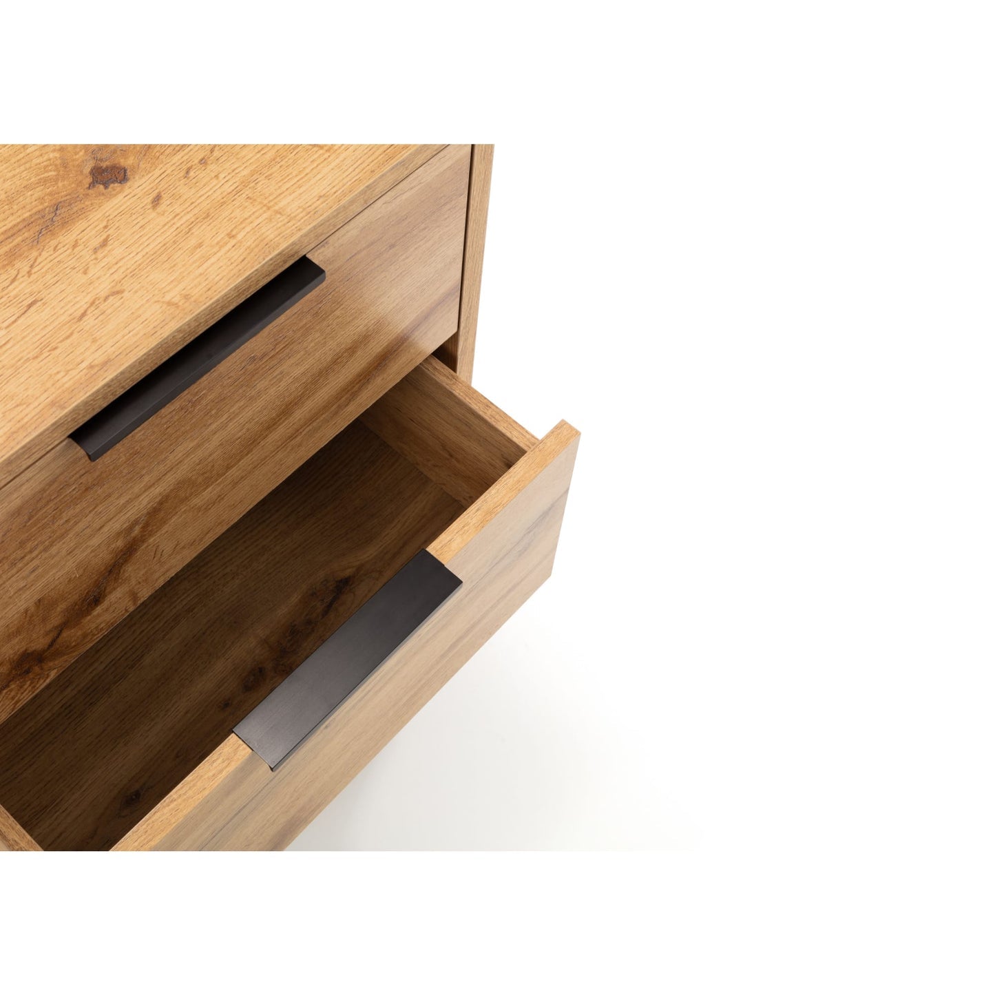 Close-up shot showing the internal drawer space and black metal lip pull handle on the Bali oak bedside table