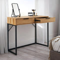 Bali natural oak effect 2 drawer dressing table desk styled with a table mirror and makeup brushes in a bright bedroom