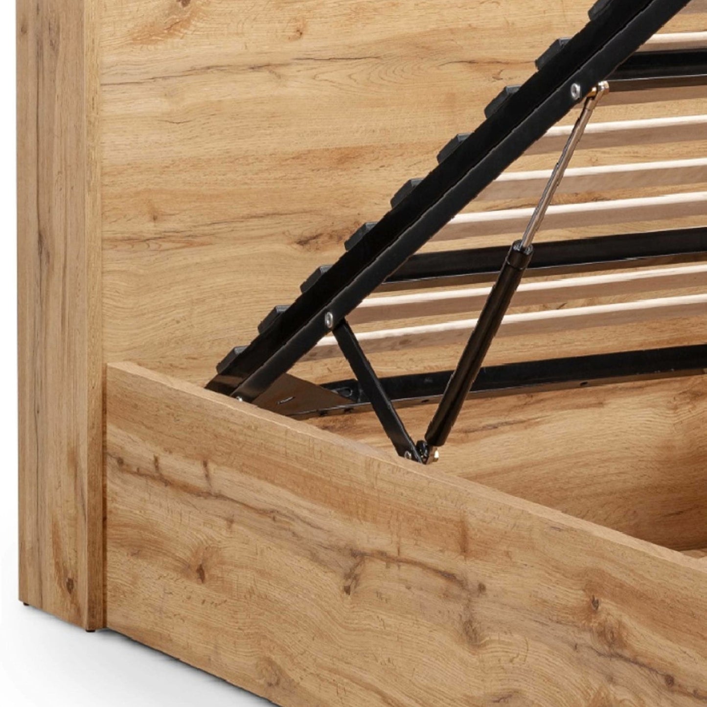 Detailed view of the metal gas-lift hydraulic hinge mechanism for the ottoman bed frame