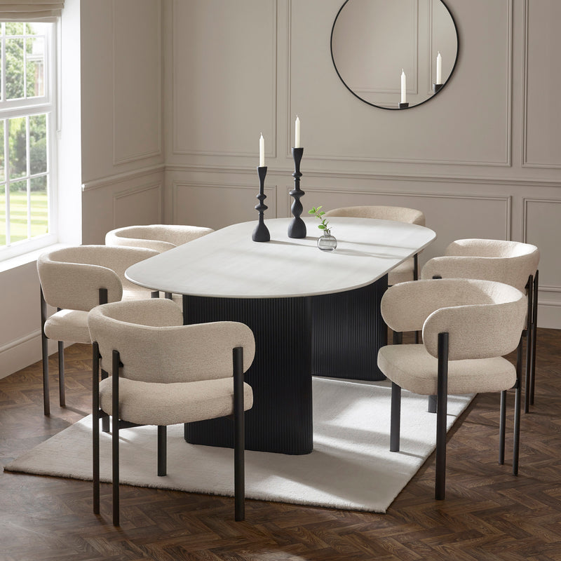 Bright dining room featuring Bolivia oval dining table with Bolivia chairs