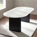 Bolivia white marble effect oval dining table styled on a white rug over parquet wooden flooring