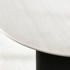 Detail of white marble effect surface on the Bolivia 220cm oval dining table