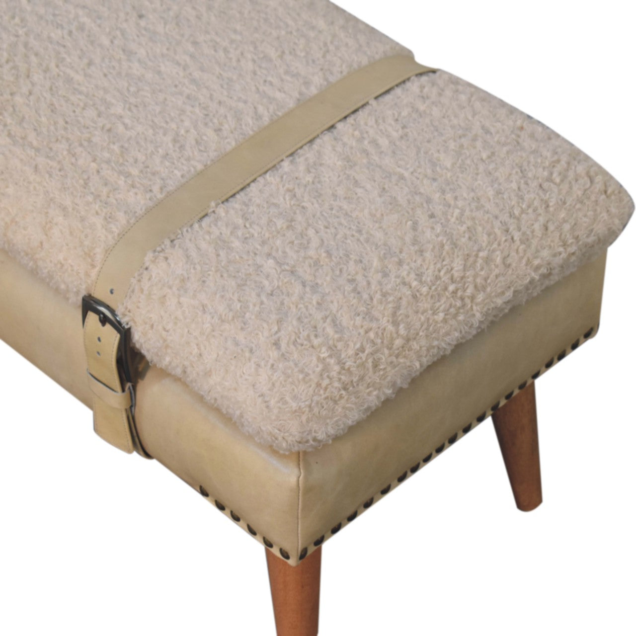 Top angle view highlighting the soft beige leather harness strap over cream bouclé.