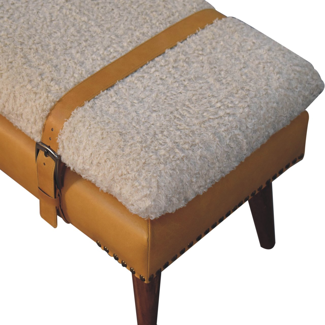 Top angle view showing the tan leather harness strap against the cream bouclé texture.