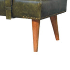 Close-up shot showing the olive green leather corner, metal studs, and wooden leg.