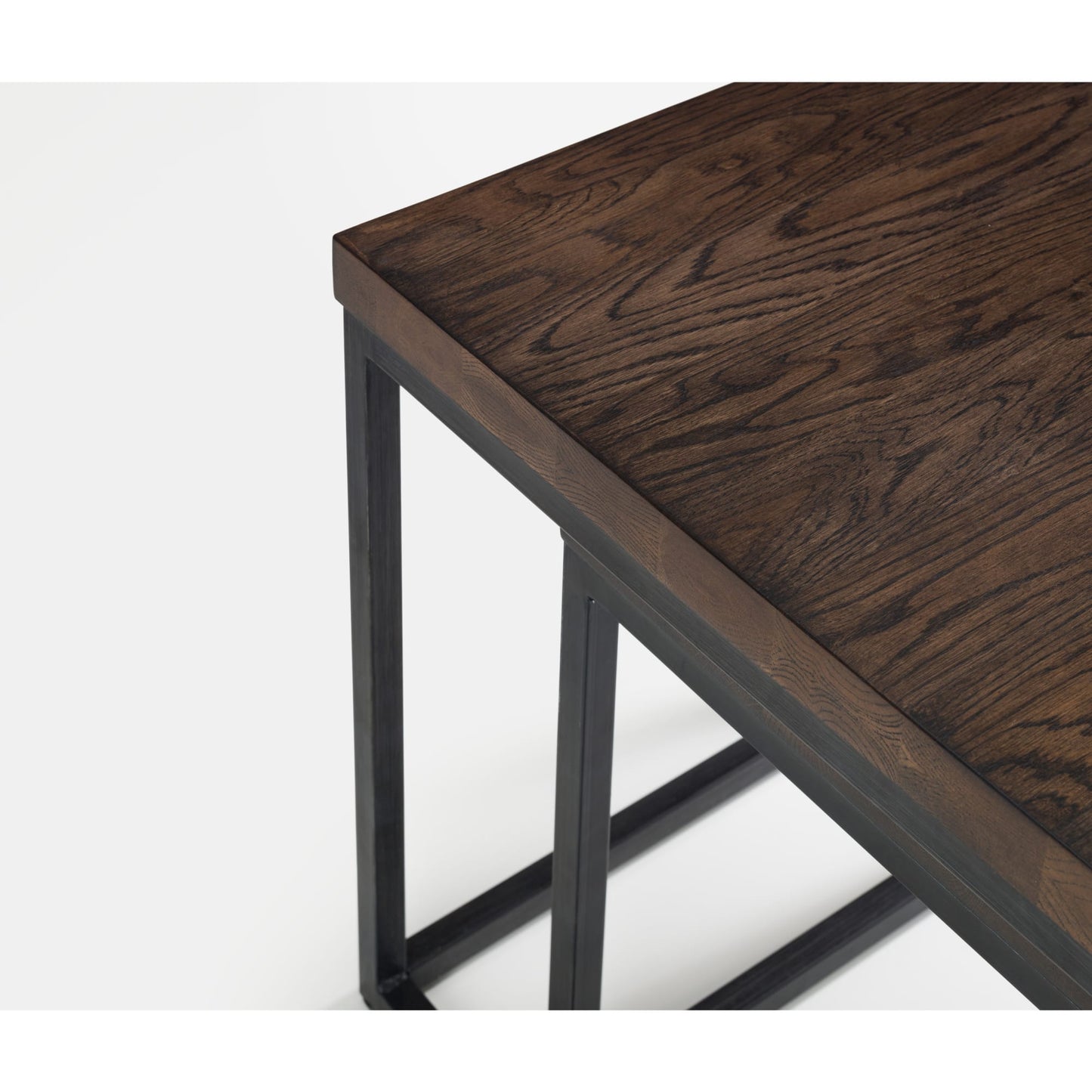 Close-up detail of the rich dark oak wood grain surface on the Brooklyn lamp table