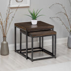 Brooklyn dark oak nesting lamp tables placed in a styled home setting with decorative greenery