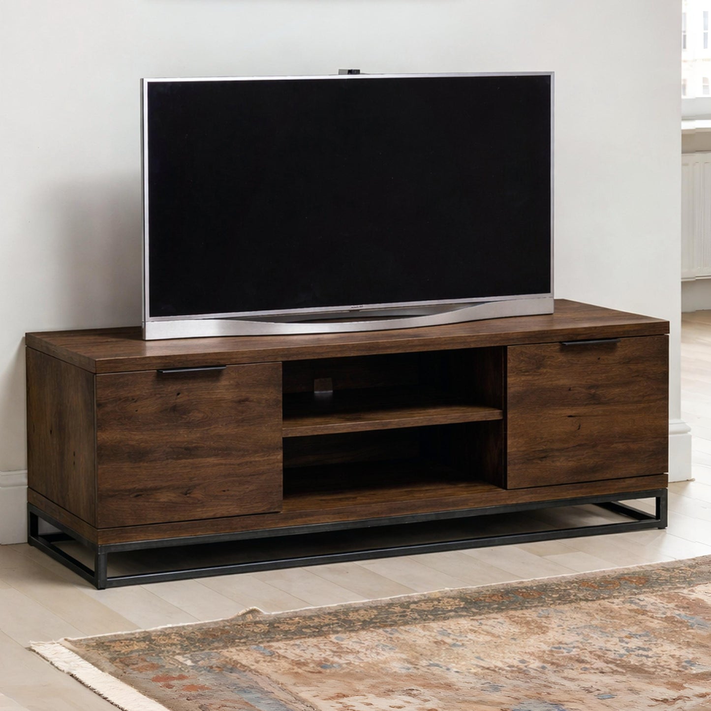 Brooklyn dark oak industrial TV unit with television styled in a modern living room setting