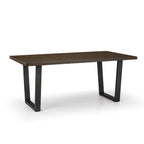 Studio view showing the dark oak tabletop finish and industrial black metal leg base.