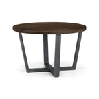Studio view of the Brooklyn round dining table in a rich dark oak finish.