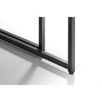 Detailed close-up of the sturdy black metal frame and leg base of the Brooklyn nesting coffee table