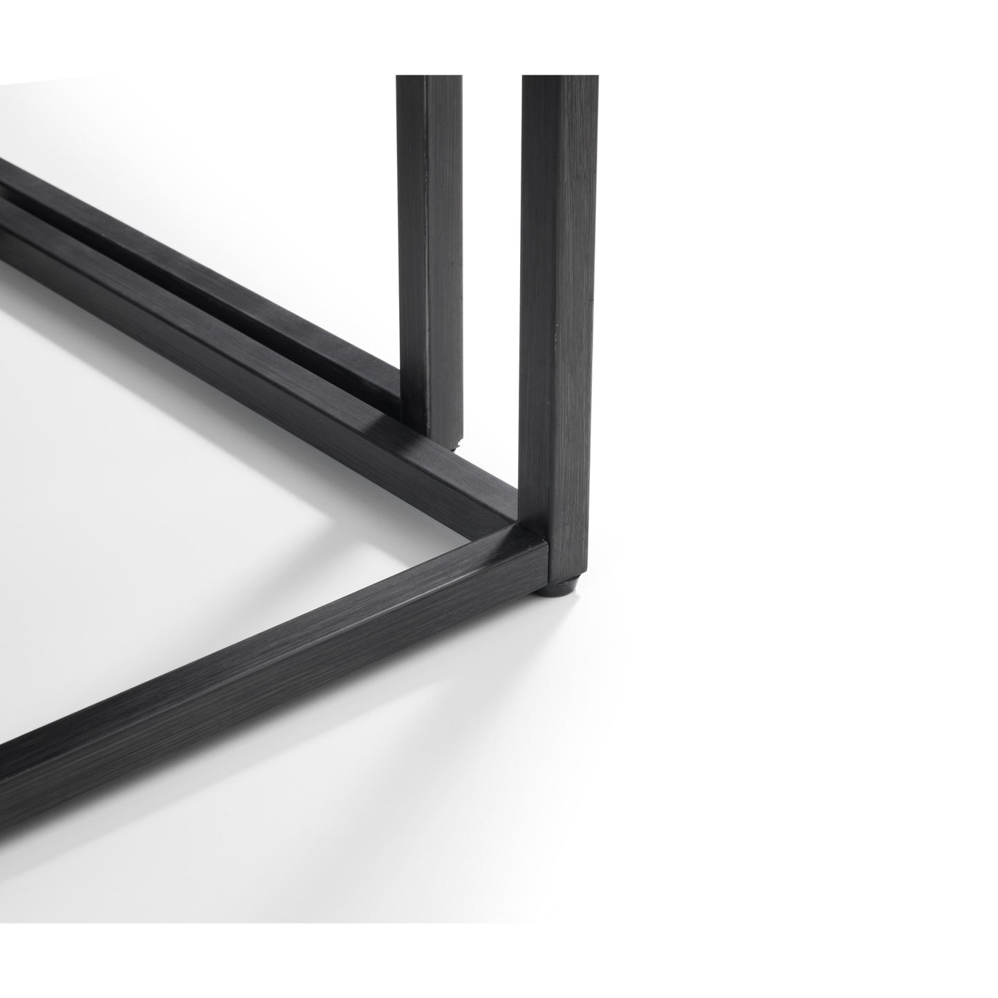 Detailed close-up showing the sturdy black metal leg joinery and frame construction