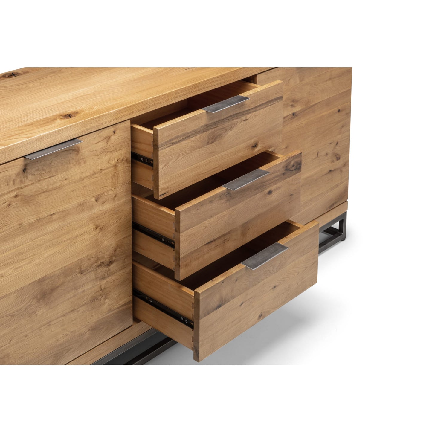 Close-up studio view of the Brooklyn oak large sideboard showing the three central drawers pulled open