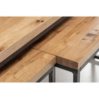 Close-up detail of the natural rustic wood grain on the Brooklyn oak nesting coffee table tops
