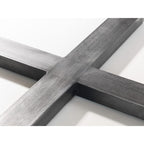 Close-up detail of the black powder-coated metal cross-base floor frame.