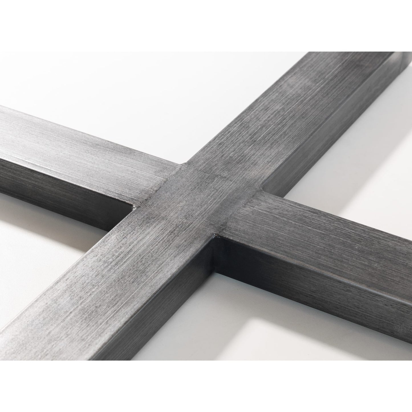 Close-up detail of the black powder-coated metal cross-base floor frame.